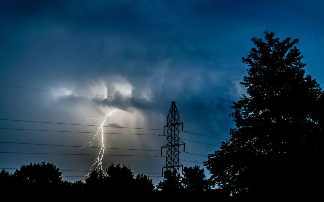 Cloudy sky and a bolt of lightning.